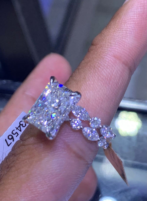 14K white gold ladies ring with large square center stone and small round stones